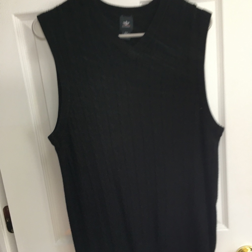 Black sweater vest with design